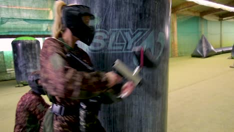Girls-and-boys-playing-indoor-paintball-7
