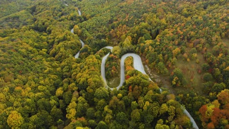 Aerial-footage-of-twisty-mountain-road-in-autumn---12