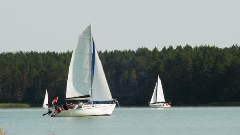 Yacht-sailing-in-Wdzydze-Lake-in-Kaszubski-park-krajobrazowy-in-Pomeranian-Voivodeship
