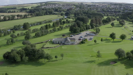 An-aerial-view-of-Turriff-Golf-Club,-Aberdeenshire,-on-a-sunny-morning