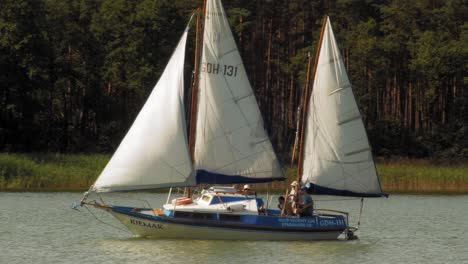 two-masted-Yacht-sailing-on-Wdzydze-Lake-in-Kaszubski-park-krajobrazowy-in-Pomeranian-Voivodeship