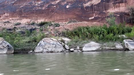 Dolly-of-canyon-wall-from-river-in-Utah