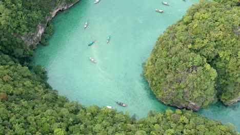 Drone-footage-of-Hong-island-lagoon-with-boats-navigating-trough-10