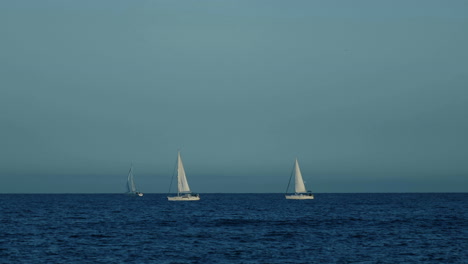 Sailing-Boats-On-Open-Sea-At-Sunny-Day