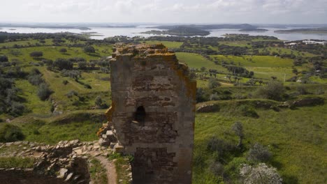Mourao-castle-and-alqueva-dam-reservoir-in-Alentejo,-Portugal
