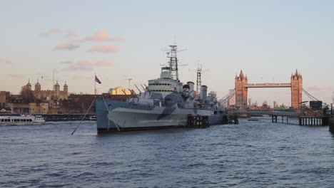 Day-view-of-HMS-Belfast-ship-in-front-of-Tower-and-Bridge-of-London