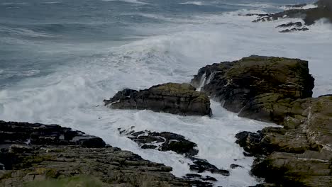 Dramatic-Ocean-Waves-Crashing-Over-Rocks-In-Slow-Motion-At-Calf-Of-Man