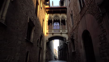 Smooth-camera-steady-shot-along-narrow-street-in-the-center-of-barcelona