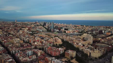 Aerial-Footage-over-Cityscape-of-Barcelona,-Spain