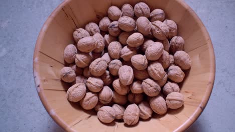Dried-walnuts-in-a-wooden-bowl