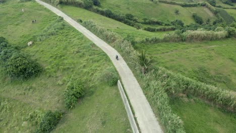 A-drone-follow-shot-of-a-motorcycle-in-Batanes
