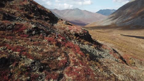 Hiker-in-the-deep-tundra-between-remote-mountains