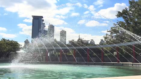 Water-spraying-from-a-fountain-in-Park-of-Paris,-Mokong,-Yangcheon-gu,-Seoul,-South-Korea
