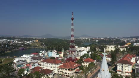 Drone-shot-of-mini-Eiffel-tower-and-church-spire-in-Da-Lat-or-Dalat-in-the-Central-Highlands-of-Vietnam-on-sunny-day