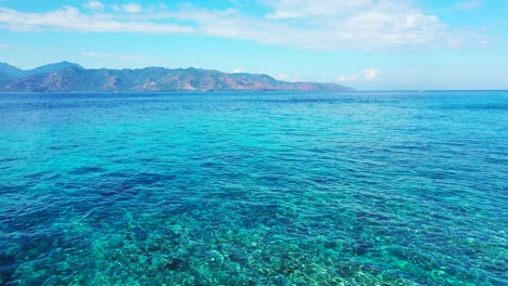 Beautiful-crystal-clear-waters-off-the-coastline-of-the-tropical-island-of-Bora-Bora