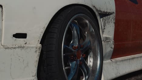 Close-Up-of-a-Modified-Car-Wheel-after-Drifting-in-the-Snow