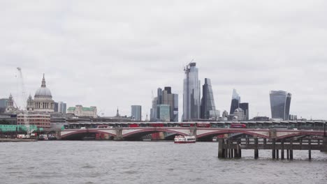 Bank---financial-district-in-London-full-of-skyscrapers-and-famous-buildings,-Thames-river-in-foreground,-wide-angle-static-view