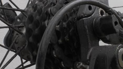 Close-Up-Of-Rear-Dirty-Spinning-Bike-Cassette