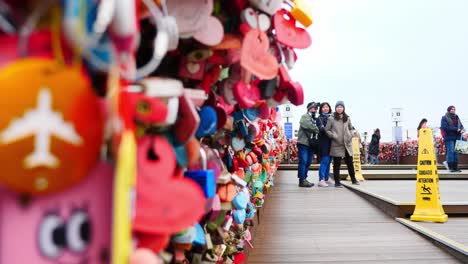 colorful-love-padlock-hanging-on-rail-at-namsan-tower-in-seoul,-south-korea