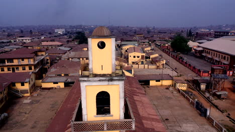 Aerial-view-of-a-tower-of-a-Mosque-in-the-Nigerian-town-of-Ogbomosho---dolly-back