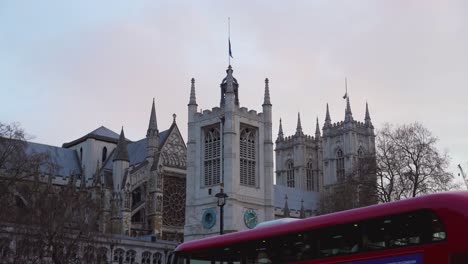 Westminster-Hall-and-Westminster-Abbey-with-flags-flying-at-half-mast-to-mark-the-death-of-Prince-Philip,-Duke-of-Edinburgh,-Saturday,-April-10th,-2021---London-UK