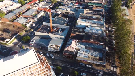 Drone-aerial-shot-of-centre-of-town-Crowne-Plaza-shops-and-suburb-of-Terrigal-tourism-Central-Coast-NSW-Australia-3840x2160-4K