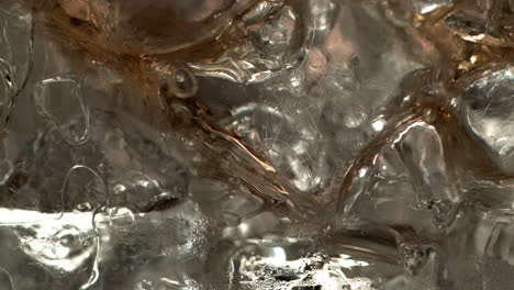 Yummy-liquid-runs-into-the-cocktail-glass-over-the-ice-in-1000+-fps-slow-motion-1
