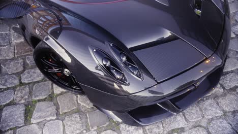 Italian-full-carbon-sport-car-front-detail-in-the-dark