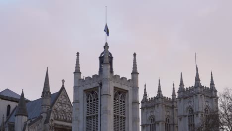 Westminster-Hall-and-Westminster-Abbey-closeup-of-flags-flying-at-half-mast-to-mark-the-death-of-Prince-Philip,-Duke-of-Edinburgh,-Saturday,-April-10th,-2021---London-UK