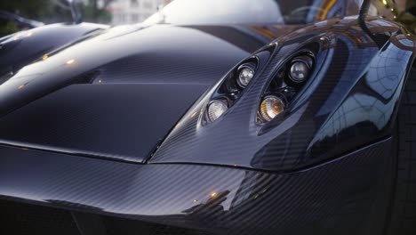 Italian-full-carbon-sport-car-front-detail-in-the-dark-1