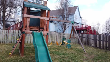 Abandoned-kids-playset-blowing-in-the-wind