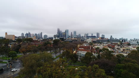 Drone-reveal-of-foggy-Melbourne-with-clouds