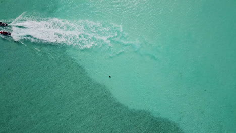 Wide-drone-shot-of-Manta-Ray-or-Sting-Ray-swimming-in-the-clear-ocean-water