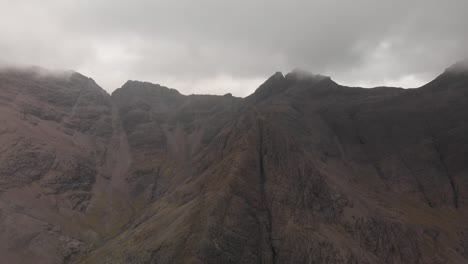 Panoramic-drone-shot-of-majestic-scotish-mountains-in-fairy-pools-location