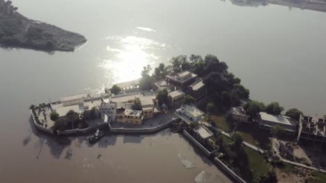 Aerial-View-Of-Sadh-Belo-Island-Temple-On-The-Indus-River,-Pakistan