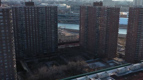 Aerial-flight-towards-highrise-apartments-in-the-Harlem-neighborhood-of-New-York-City