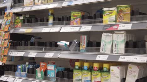 Restricted-supermarket-corona-virus-panic-buying-shoppers-store-shelves-limited-stock