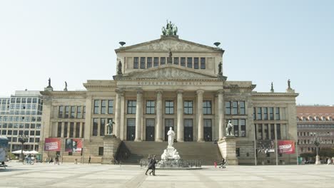 Historic-Concert-Hall-with-White-Statue-in-Foreground-at-Gendarmenmarkt