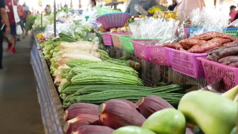 Close-up-Footage-of-Exotic-Vegetables-Displaying-on-Stalls-in-the-Asian-Street-Market
