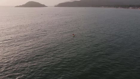 Aerial-drone-View-Tourists-Kayaking-At-Palolem-Beach-Goa-on-a-Tropical-Holiday-in-India-and-a-Pristine-Location