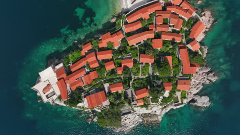 Slow-aerial-footage-flying-over-Sveti-Stefan-Island