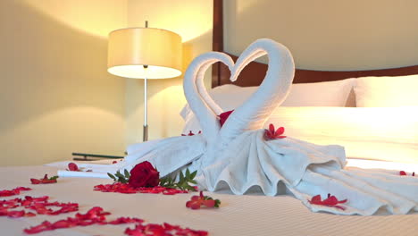 Towels-in-Shape-of-Swans-on-Bed-in