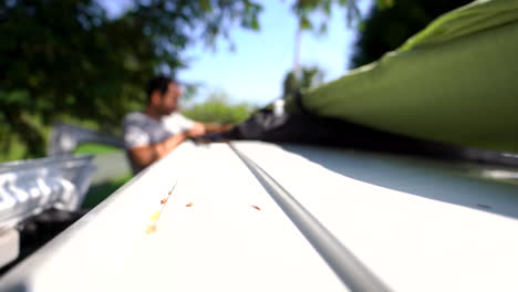 installing-a-long-board-surf-on-the-roof