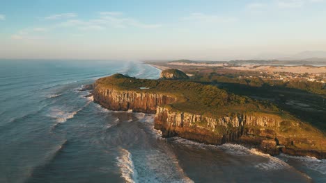 Drone-aerial-cinematic-shot-of-rocky-cliffs-on-atlantic-ocean