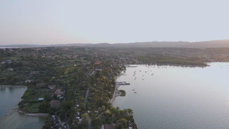 Salo-Italian-town-aerial-panorama,-tourist-resort-by-Lake-Garda-famous-promenade