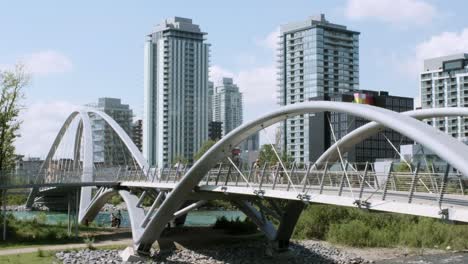 Calgary-East-Village-with-George-King-suspension-Bridge-on-Bow-River