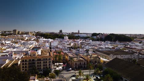 Aerial-pan-left-of-popular-travel-destination-Sanlucar,-Cadiz,-Spain