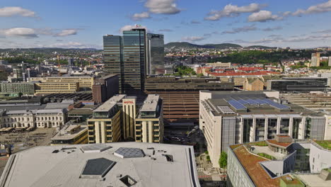 Oslo-Norway-v26-low-flyover-opera-house-and-central-station-capturing-gamle-cityscape-with-a-mix-of-historic-old-buildings-and-modern-contemporary-architectures---Shot-with-Mavic-3-Cine---June-2022