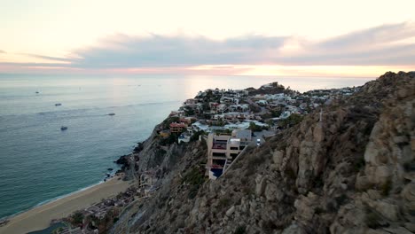 Aerial-Reveal-of-Cabo-Ocean-at-Sunset