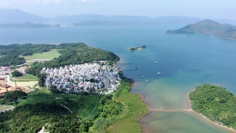 Hong-Kong-Tseng-Tau-Tsuen-waterfront-houses,-Aerial-view